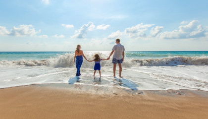 Family travel to the beach