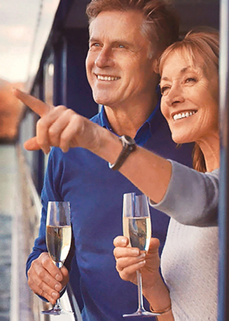 couple with drinks on ship