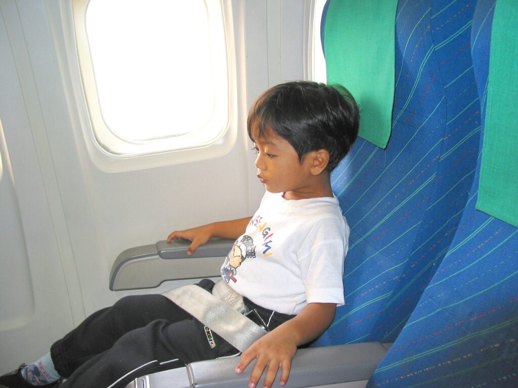 child in airplane